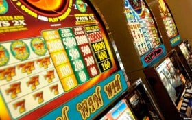Fishing Arcade interface showing animated ocean reels with virtual fish targets